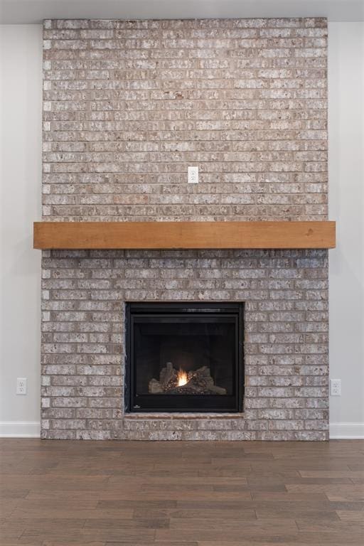 590 Emmy Jean Dr, Blanchard, OK 73010 - detailed view of wood finished floors and a fireplace