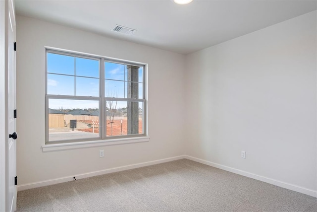 590 Emmy Jean Dr, Blanchard, OK 73010 - empty room featuring plenty of natural light and carpet