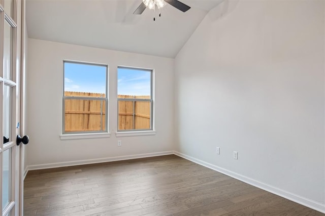 590 Emmy Jean Dr, Blanchard, OK 73010 - empty room with ceiling fan, vaulted ceiling, and wood finished floors