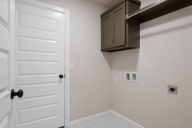 laundry room with cabinets, washer hookup, and electric dryer hookup