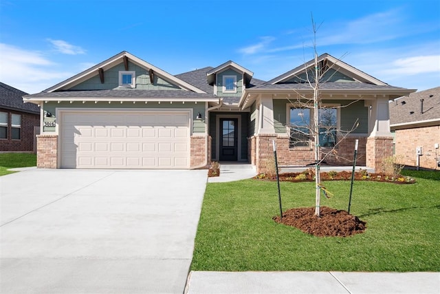 craftsman-style home featuring a garage and a front lawn