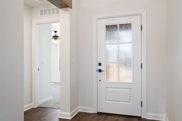 entryway with ceiling fan and dark hardwood / wood-style flooring