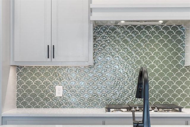 kitchen with tasteful backsplash