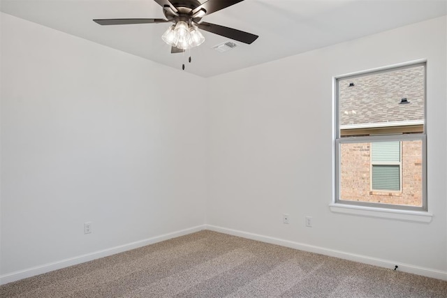 carpeted empty room with ceiling fan