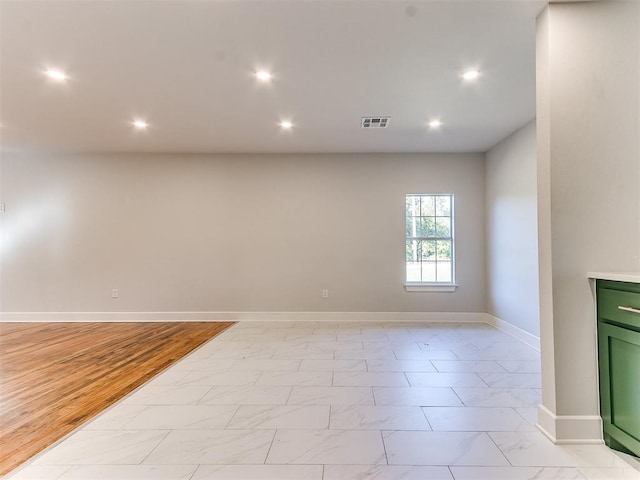 unfurnished room featuring light wood-type flooring