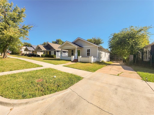 view of front of house with a porch and a front yard