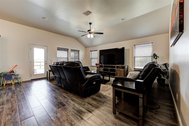 living room with ceiling fan, dark hardwood / wood-style flooring, and lofted ceiling