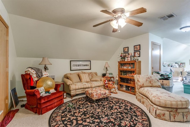 carpeted living room featuring vaulted ceiling and ceiling fan