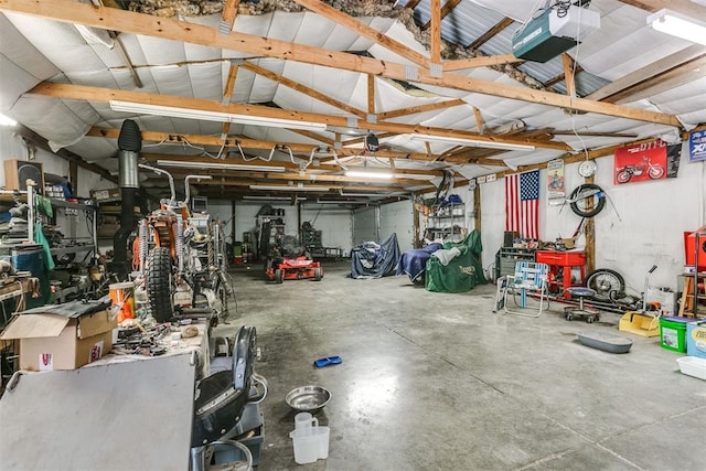 garage featuring a garage door opener