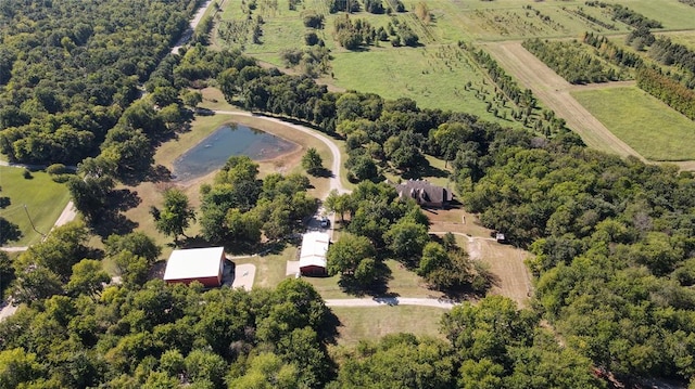 aerial view featuring a rural view and a water view