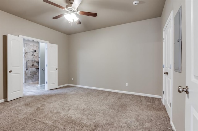 unfurnished bedroom with ceiling fan and light carpet