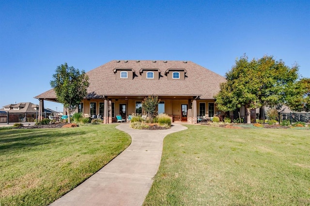 view of front of home featuring a front yard