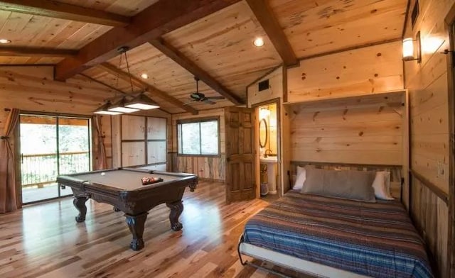 rec room with ceiling fan, billiards, vaulted ceiling with beams, light hardwood / wood-style floors, and wood walls