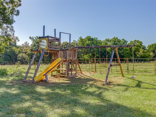 view of jungle gym with a yard