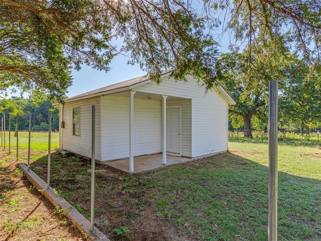 garage with a yard