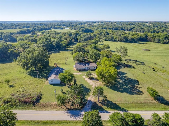 birds eye view of property featuring a rural view