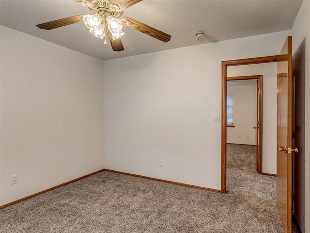 unfurnished room with light carpet and ceiling fan