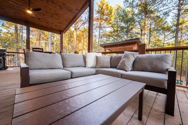 wooden deck featuring area for grilling