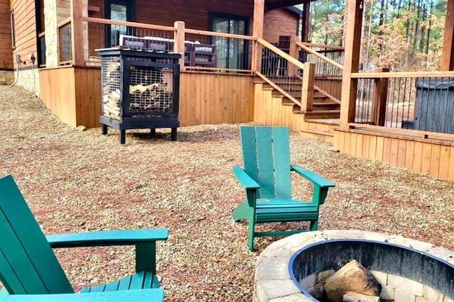 180 Alumacraft Trl, Broken Bow, OK 74728 - view of jungle gym with an outdoor fire pit and stairway