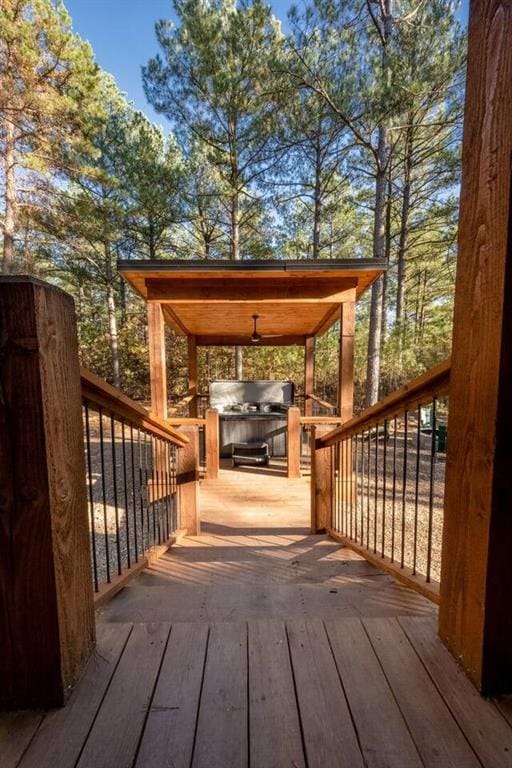 180 Alumacraft Trl, Broken Bow, OK 74728 - wooden deck featuring a hot tub