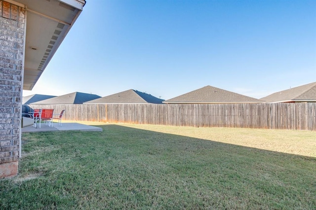 view of yard featuring a fenced backyard and a patio