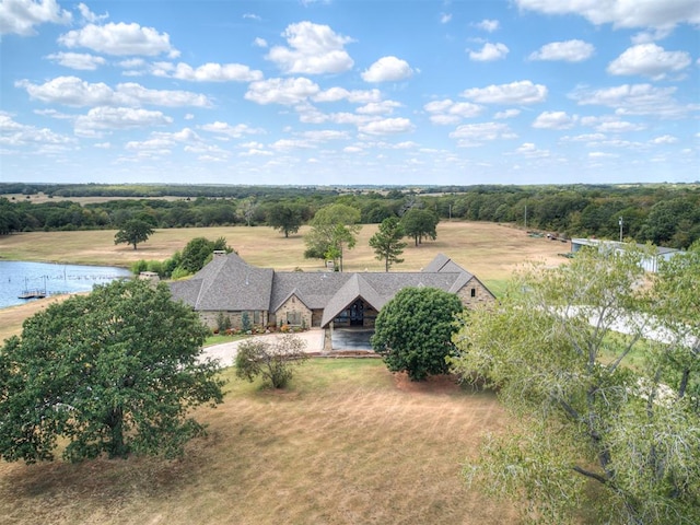 birds eye view of property with a rural view and a water view