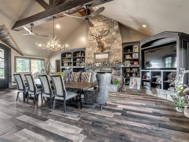 dining area with beam ceiling, ceiling fan with notable chandelier, and hardwood / wood-style flooring