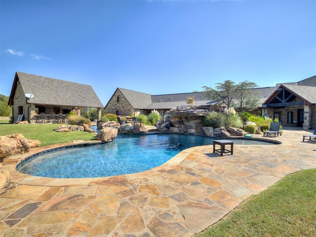 view of swimming pool featuring a patio area