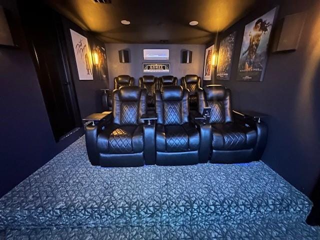 home theater room featuring carpet