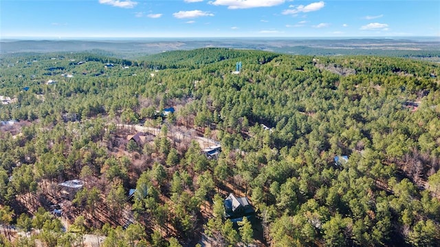 bird's eye view featuring a view of trees