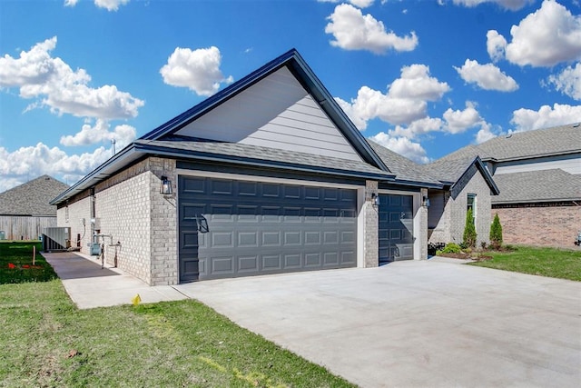 view of side of home featuring central AC unit and a garage