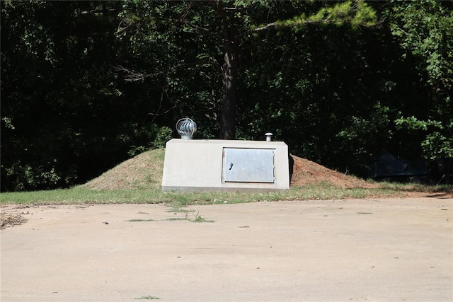 view of entry to storm shelter