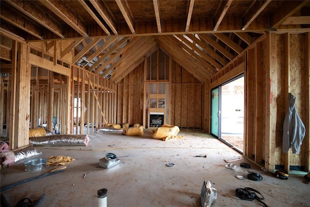 misc room with high vaulted ceiling