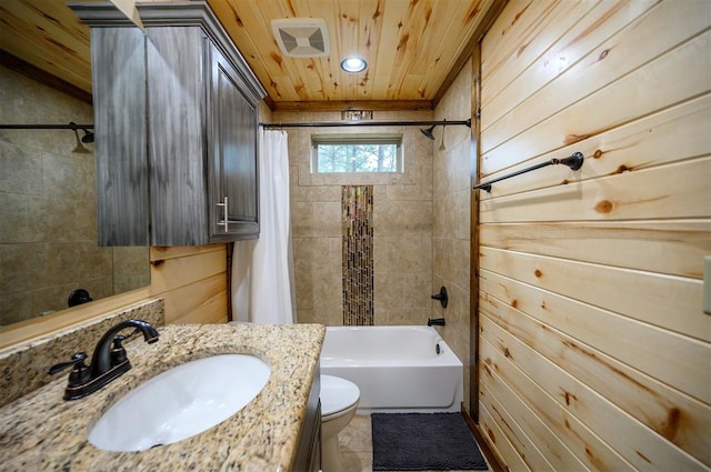 full bathroom with vanity, wood walls, wooden ceiling, toilet, and shower / bathtub combination with curtain