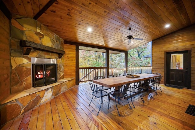 dining room featuring ceiling fan, wooden ceiling, vaulted ceiling, and hardwood / wood-style flooring