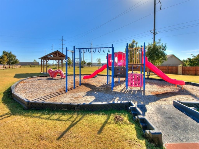 view of playground featuring a lawn