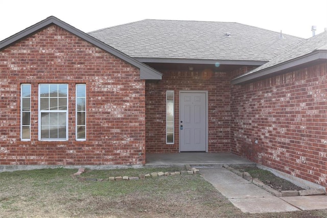 property entrance featuring a patio