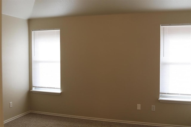 empty room with carpet flooring