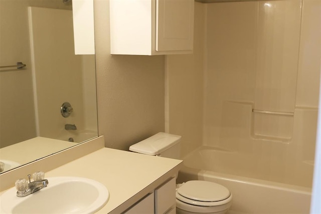 full bathroom featuring vanity, toilet, and washtub / shower combination