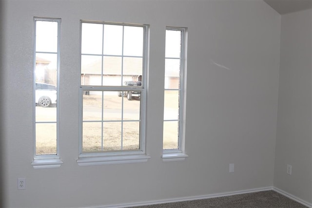 entryway with carpet flooring