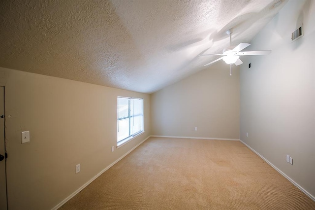 bonus room with a textured ceiling, ceiling fan, lofted ceiling, and light carpet