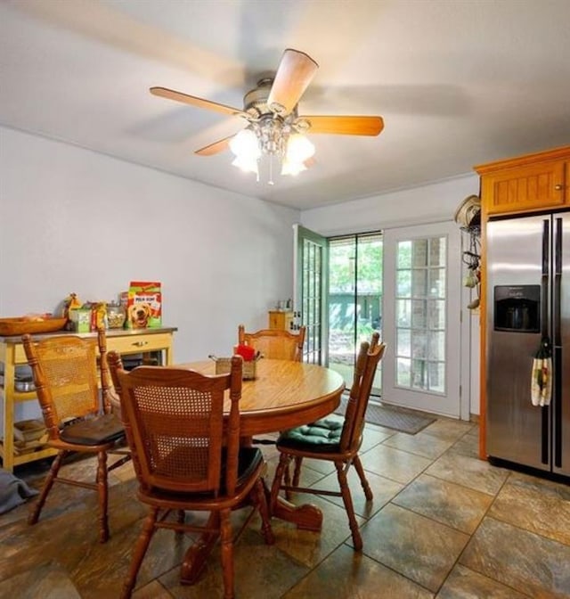 dining space with ceiling fan