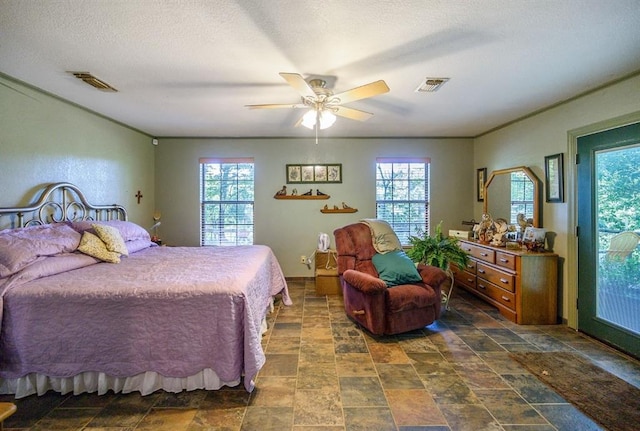 bedroom with ceiling fan, access to exterior, and multiple windows