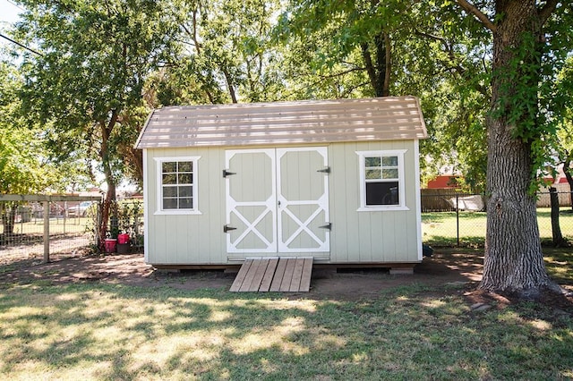 view of outdoor structure with a yard