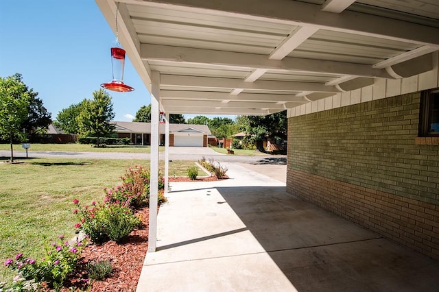 view of patio featuring a garage