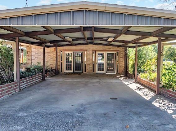 view of patio / terrace with a carport