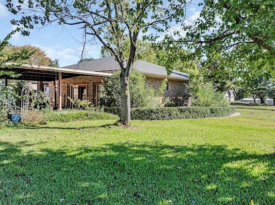 exterior space featuring a lawn