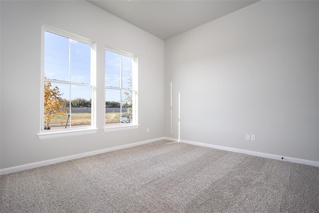 empty room featuring carpet flooring