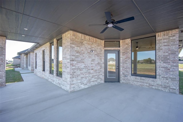 view of patio / terrace featuring ceiling fan