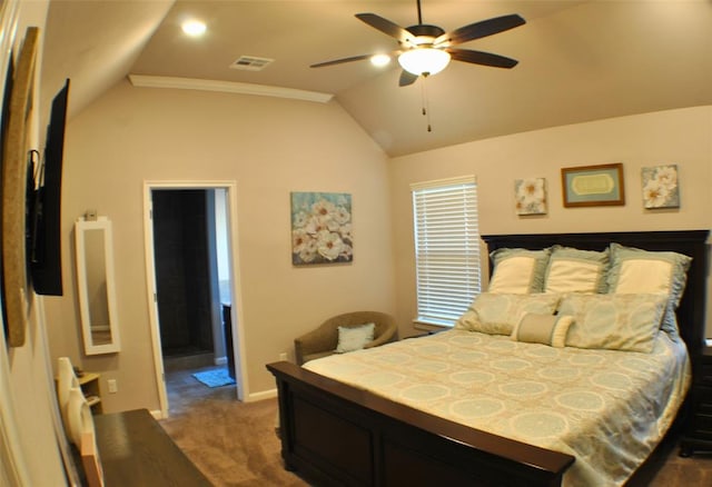 carpeted bedroom with ornamental molding, ceiling fan, and lofted ceiling